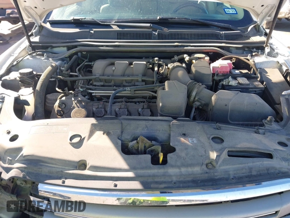2015 Ford Taurus SEL with VIN 1FAHP2E8XFG182899, listed as a IAAI auction lot 41209454 with 93,477 mi miles and . Bid and sale history available at carsss.com. Image 10.
