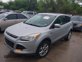 2013 Ford Escape SEL with VIN 1FMCU0H99DUC72013, listed as a IAAI auction lot 41952599 with 177,081 mi miles. Bid and sale history available at carsss.com. Image 2.