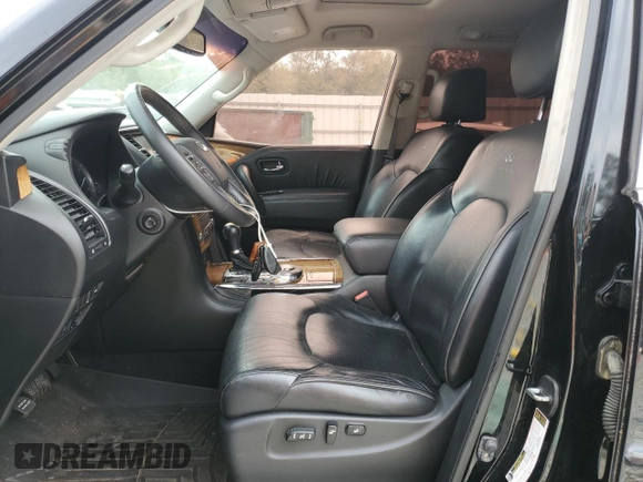 2011 Infiniti QX56 7-passenger with VIN JN8AZ2NF9B9504083, listed as a Copart auction lot 75199764 with 128,794 mi miles and Salvage Title. Bid and sale history available at carsss.com. Image 7.