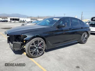 2021 BMW 5 Series 540i with VIN WBA53BJ05MWW92487, listed as a Copart auction lot 57679975 with 53,311 mi miles and Salvage title. Bid and sale history available at DreamBid. Image 1.