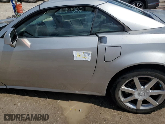 2004 Cadillac XLR z VIN 1G6YV34A545602056, wystawiony jako Copart lot #66506514 z przebiegiem Nie podano mil oraz Nie do naprawy • Non repairable. Historia ofert i sprzedaży dostępna na DreamBid. Obrazek 12.