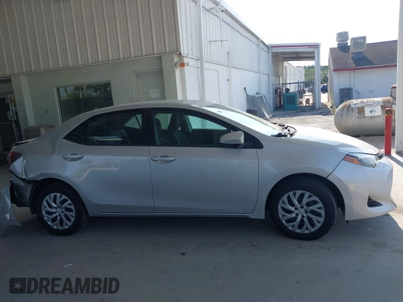 2018 Toyota Corolla L z VIN 5YFBURHE2JP827894, wystawiony jako IAAI lot #42295741 z przebiegiem 44 171 mil mil oraz . Historia ofert i sprzedaży dostępna na DreamBid. Obrazek 13.