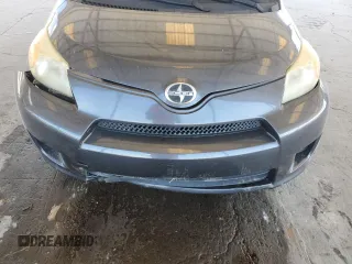 2009 Scion xD z VIN JTKKU10419J046166, wystawiony jako Copart lot #56123435 z przebiegiem 184 030 mil mil oraz Szkoda całkowita • Salvage title. Historia ofert i sprzedaży dostępna na DreamBid. Obrazek 11.