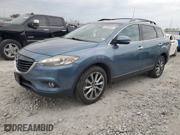 2015 Mazda CX-9 Grand Touring z VIN JM3TB2DAXF0448042, wystawiony jako Copart lot #53620085 z przebiegiem 134 386 mil mil oraz Szkoda całkowita • Salvage title. Historia ofert i sprzedaży dostępna na DreamBid. Obrazek 1.