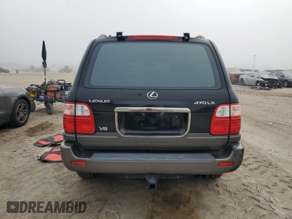 2001 Lexus LX 470 z VIN JTJHT00W513509447, wystawiony jako Copart lot #43988595 z przebiegiem 251 861 mil mil oraz Tytuł czysty. Historia ofert i sprzedaży dostępna na DreamBid. Obrazek 6.