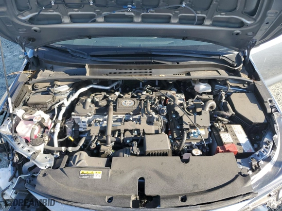 2024 Toyota Corolla Hybrid LE with VIN JTDBCMFE7RJ021526, listed as a Copart auction lot 46143595 with 16,901 mi miles and Salvage Title. Bid and sale history available at carsss.com. Image 12.
