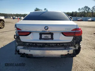 2019 BMW 7 Series 750i with VIN WBA7F0C5XKGM25897, listed as a Copart auction lot 86758004 with 68,700 mi miles and Salvage title. Bid and sale history available at DreamBid. Image 6.