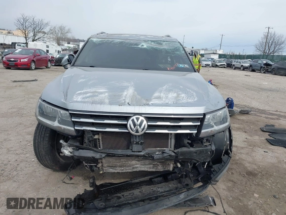 2020 Volkswagen Tiguan SE with VIN 3VV2B7AX6LM026760, listed as a IAAI auction lot 41652292 with 63,925 mi miles and . Bid and sale history available at DreamBid. Image 11.
