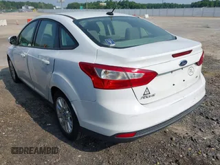 2012 Ford Focus SE with VIN 1FAHP3F21CL192126, listed as a IAAI auction lot 42598631 with 125,741 mi miles and . Bid and sale history available at DreamBid. Image 3.