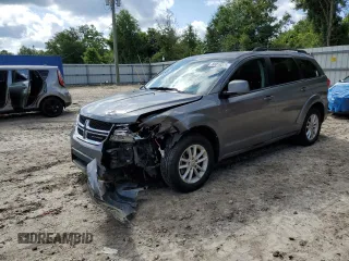 2013 Dodge Journey SXT with VIN 3C4PDCBG8DT570643, listed as a Copart auction lot 60310375 with 122,403 mi miles and Salvage title. Bid and sale history available at DreamBid. Image 1.