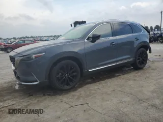 2022 Mazda CX-9 Grand Touring z VIN JM3TCBDYXN0623768, wystawiony jako Copart lot #56420775 z przebiegiem 55 192 mil mil oraz Szkoda całkowita • Salvage title. Historia ofert i sprzedaży dostępna na DreamBid. Obrazek 1.