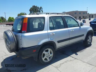 1999 Honda CR-V EX z VIN JHLRD1863XC062580, wystawiony jako IAAI lot #42334947 z przebiegiem 210 155 mil mil oraz . Historia ofert i sprzedaży dostępna na DreamBid. Obrazek 4.