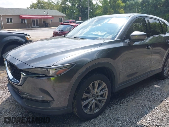 2020 Mazda CX-5 Grand Touring with VIN JM3KFBDM1L0821975, listed as a IAAI auction lot 40088794 with 68,895 mi miles and . Bid and sale history available at DreamBid. Image 18.
