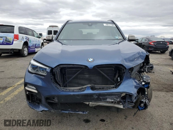 2021 BMW X5 M50i with VIN 5UXJU4C03M9E52555, listed as a Copart auction lot 48171365 with 64,731 mi miles and Salvage Title. Bid and sale history available at carsss.com. Image 5.