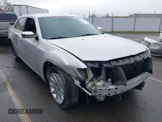 2011 Chrysler 300 Limited with VIN 2C3CA5CG9BH614354, listed as a IAAI auction lot 41216730 with 141,670 mi miles. Bid and sale history available at carsss.com. Image 1.