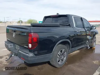 2017 Honda Ridgeline RTL-E with VIN 5FPYK3F7XHB030565, listed as a IAAI auction lot 41795386 with 79,252 mi miles and . Bid and sale history available at DreamBid. Image 4.