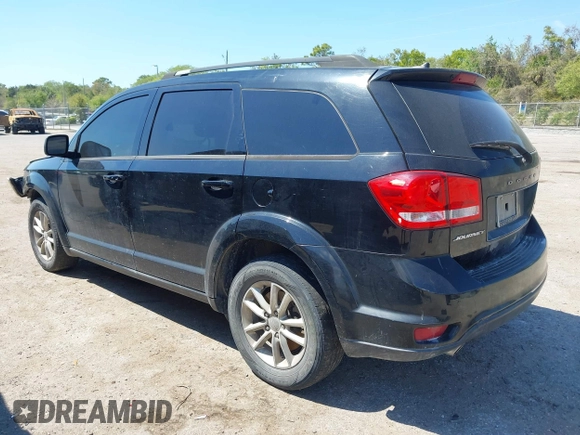 2014 Dodge Journey SXT with VIN 3C4PDCBG5ET250732, listed as a IAAI auction lot 41900940 with 144,301 mi miles. Bid and sale history available at carsss.com. Image 3.