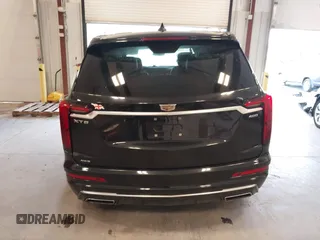 2022 Cadillac XT6 Premium Luxury z VIN 1GYKPDRS0NZ131233, wystawiony jako IAAI lot #41600244 z przebiegiem 112 258 mil mil oraz . Historia ofert i sprzedaży dostępna na DreamBid. Obrazek 16.