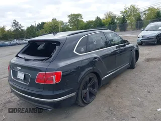 2018 Bentley Bentayga Signature z VIN SJAAC2ZV8JC017393, wystawiony jako IAAI lot #40349518 z przebiegiem 71 203 mil mil oraz . Historia ofert i sprzedaży dostępna na DreamBid. Obrazek 4.