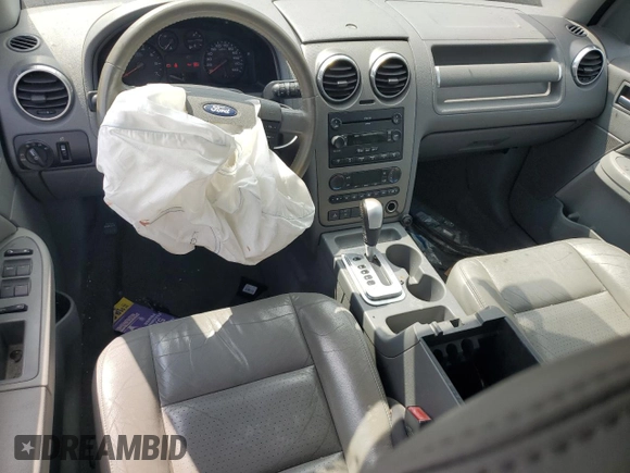 2005 Ford Freestyle SEL с VIN 1FMZK02105GA32268, выставлен на аукционе Copart как лот 63659795 с пробегом Не указан миль и Списание • Salvage title. История ставок и продаж доступна на DreamBid. Изображение 8.