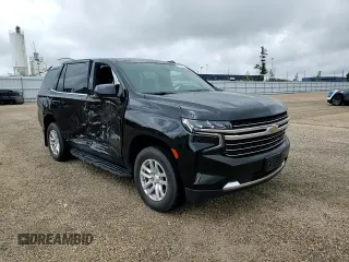 2022 Chevrolet Tahoe LT z VIN 1GNSKNKD0NR196614, wystawiony jako Copart lot #57806285 z przebiegiem 25 706 mil mil oraz Szkoda całkowita • Salvage title. Historia ofert i sprzedaży dostępna na DreamBid. Obrazek 14.