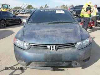2006 Honda Civic Cpe EX with VIN 2HGFG11836H566191, listed as a IAAI auction lot 41590718 with 151,004 mi miles. Bid and sale history available at carsss.com. Image 12.
