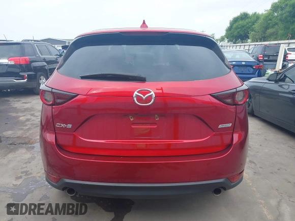2019 Mazda CX-5 Touring with VIN JM3KFACM7K0696815, listed as a IAAI auction lot 41921763 with 46,900 mi miles. Bid and sale history available at carsss.com. Image 17.