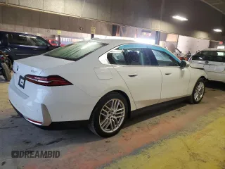 2024 BMW 5 Series 530i xDrive with VIN WBA53FJ02RCR63733, listed as a Copart auction lot 41767235 with Not provided miles and Clean title. Bid and sale history available at DreamBid. Image 3.