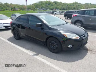 2012 Ford Focus SE with VIN 1FAHP3F24CL275128, listed as a IAAI auction lot 42121816 with 200,716 mi miles and . Bid and sale history available at carsss.com. Image 1.