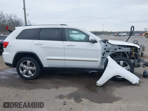 2013 Jeep Grand Cherokee Overland with VIN 1C4RJECG5DC648593, listed as a IAAI auction lot 41576630 with 187,098 mi miles. Bid and sale history available at carsss.com. Image 14.