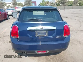 2015 MINI Hardtop 4 Door with VIN WMWXS5C50FT830060, listed as a IAAI auction lot 42744826 with 99,813 mi miles and . Bid and sale history available at DreamBid. Image 16.