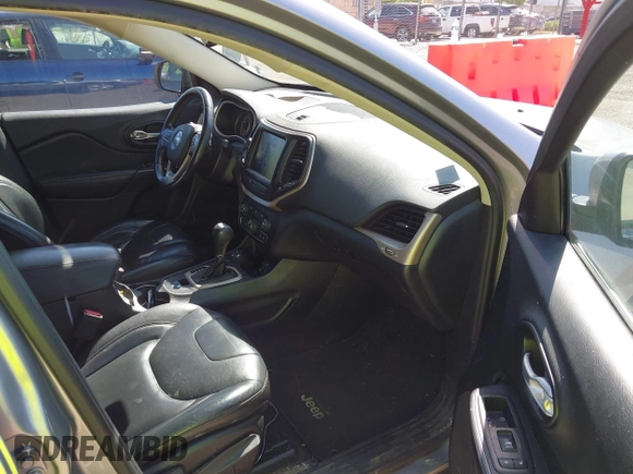 2016 Jeep Cherokee Limited with VIN 1C4PJMDB1GW373585, listed as a IAAI auction lot 42231662 with 187,752 mi miles and . Bid and sale history available at DreamBid. Image 5.