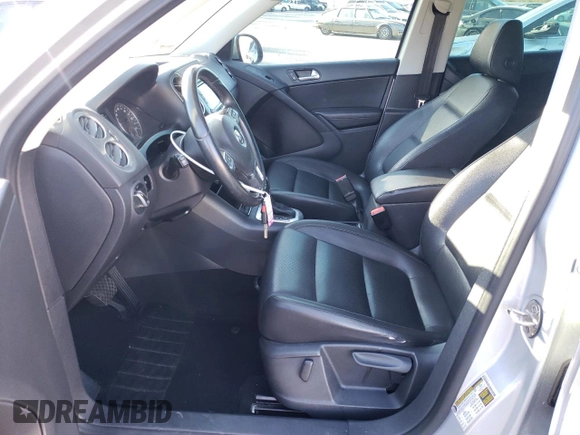 2012 Volkswagen Tiguan LE with VIN WVGAV7AX2CW580035, listed as a Copart auction lot 47297205 with 118,211 mi miles and Salvage title. Bid and sale history available at DreamBid. Image 7.