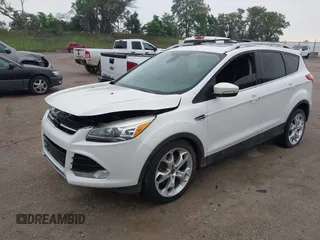 2013 Ford Escape Titanium z VIN 1FMCU9J96DUA59051, wystawiony jako IAAI lot #42628711 z przebiegiem Nie podano mil oraz . Historia ofert i sprzedaży dostępna na DreamBid. Obrazek 2.