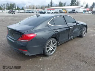 2020 Genesis G70 2.0T with VIN KMTG44LAXLU062079, listed as a IAAI auction lot 41913591 with 24,556 mi miles. Bid and sale history available at carsss.com. Image 4.