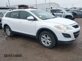 2011 Mazda CX-9 Touring with VIN JM3TB2CA9B0306888, listed as a IAAI auction lot 41388857 with 124,627 mi miles and . Bid and sale history available at DreamBid. Image 1.