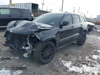 2017 Jeep Grand Cherokee SRT with VIN 1C4RJFDJ7HC641926, listed as a IAAI auction lot 41272215 with 117,667 mi miles. Bid and sale history available at carsss.com. Image 16.