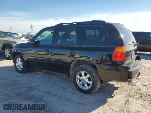 2005 GMC Envoy SLT with VIN 1GKDS13S352297652, listed as a Copart auction lot 41614205 with 71,937 mi miles and Salvage Title. Bid and sale history available at carsss.com. Image 2.
