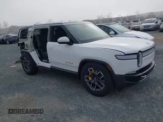 2023 Rivian R1S Adventure with VIN 7PDSGABA8PN017893, listed as a IAAI auction lot 41573814 with 20,392 mi miles. Bid and sale history available at carsss.com. Image 1.