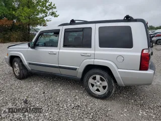 2007 Jeep Commander Sport z VIN 1J8HG48K97C598103, wystawiony jako Copart lot #65140225 z przebiegiem 204 638 mil mil oraz Czysty tytuł • Clean title. Historia ofert i sprzedaży dostępna na DreamBid. Obrazek 2.