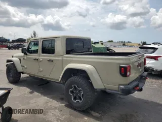 2022 Jeep Gladiator Rubicon с VIN 1C6JJTBG2NL171598, выставлен на аукционе Copart как лот 59494925 с пробегом 46 097 миль миль и Списание • Salvage title. История ставок и продаж доступна на DreamBid. Изображение 2.