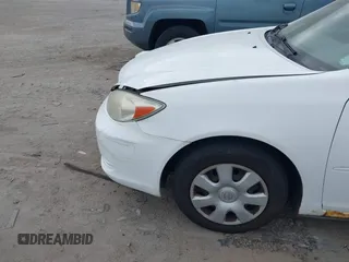 2003 Toyota Camry LE z VIN 4T1BE32K33U219697, wystawiony jako IAAI lot #42003327 z przebiegiem 217 500 mil mil oraz . Historia ofert i sprzedaży dostępna na DreamBid. Obrazek 6.