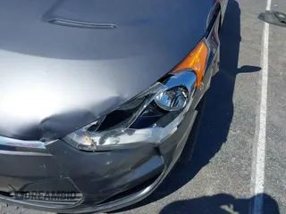 2015 Hyundai Veloster with VIN KMHTC6AD1FU233648, listed as a IAAI auction lot 41822881 with 162,368 mi miles. Bid and sale history available at carsss.com. Image 6.