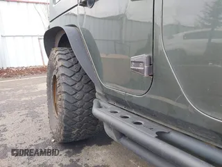 2008 Jeep Wrangler Unlimited Rubicon with VIN 1J8GA69168L591089, listed as a IAAI auction lot 41487746 with 161,916 mi miles and . Bid and sale history available at DreamBid. Image 20.