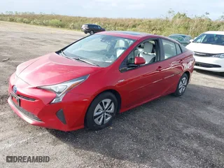 2016 Toyota Prius Four with VIN JTDKARFU9G3525328, listed as a IAAI auction lot 40791654 with 122,864 mi miles. Bid and sale history available at carsss.com. Image 2.