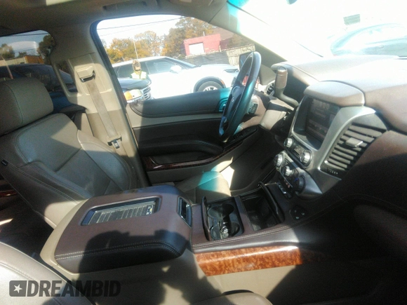 2015 Chevrolet Suburban LTZ with VIN 1GNSKKKC0FR551031, listed as a IAAI auction lot 40694559 with 184,261 mi miles. Bid and sale history available at carsss.com. Image 5.