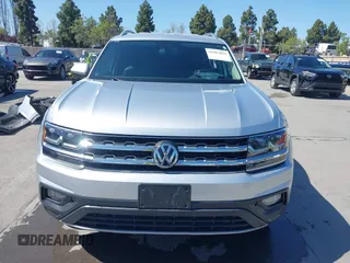 2018 Volkswagen Atlas SE с VIN 1V2DR2CA9JC502205, выставлен на аукционе IAAI как лот 41983821 с пробегом 99 618 миль миль и . История ставок и продаж доступна на DreamBid. Изображение 13.