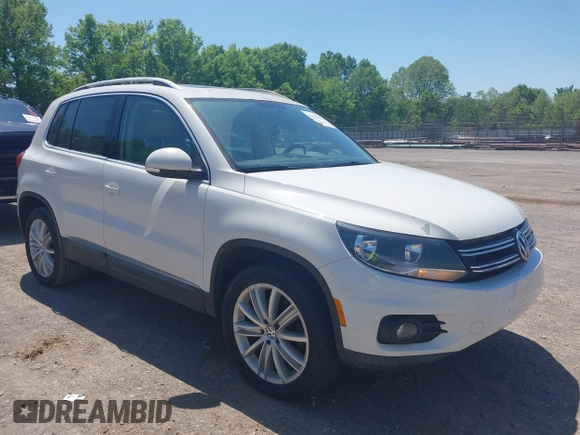 2013 Volkswagen Tiguan SE with VIN WVGAV7AX4DW528410, listed as a IAAI auction lot 42142132 with 148,511 mi miles and . Bid and sale history available at DreamBid. Image 1.