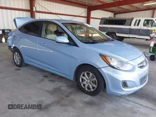 2014 Hyundai Accent GLS with VIN KMHCT4AE8EU704450, listed as a IAAI auction lot 42153043 with 139,715 mi miles. Bid and sale history available at carsss.com. Image 1.
