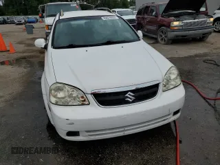 2008 Suzuki Forenza z VIN KL5JD86Z18K751692, wystawiony jako Copart lot #62879024 z przebiegiem 115 644 mil mil oraz Szkody całkowita. Historia ofert i sprzedaży dostępna na DreamBid. Obrazek 5.